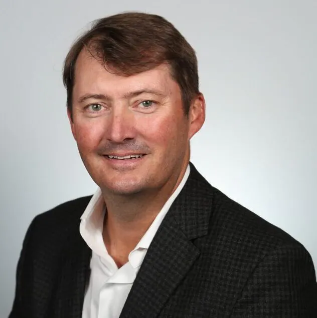 Portrait of Troy Scott, Founder of Persepta, specializing in AI for data analytics and digital transformation